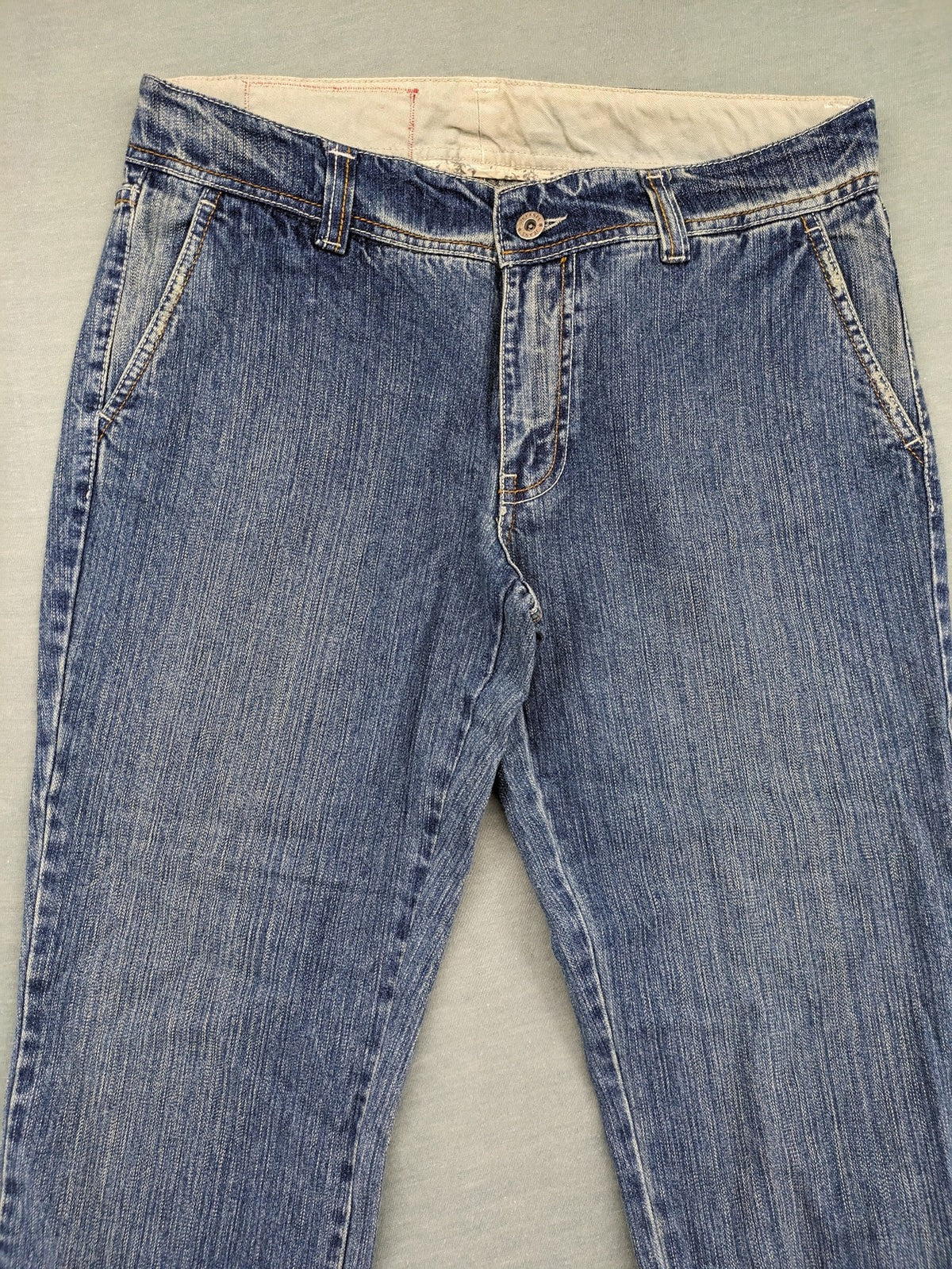 Stefanel blue straight jeans with cuffed hem and classic 5-pocket design.