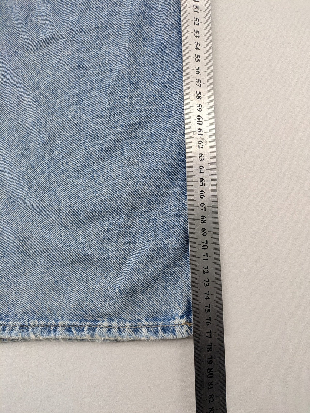 H&M blue wide leg jeans with distressed details and high waist, 100% cotton.