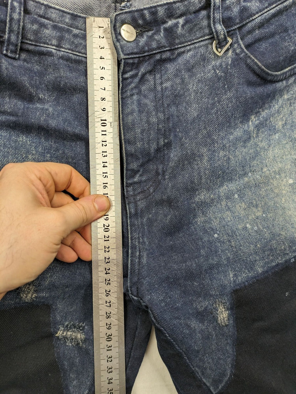 Reternity straight jeans blue black patchwork design with distressed details and frayed seams.