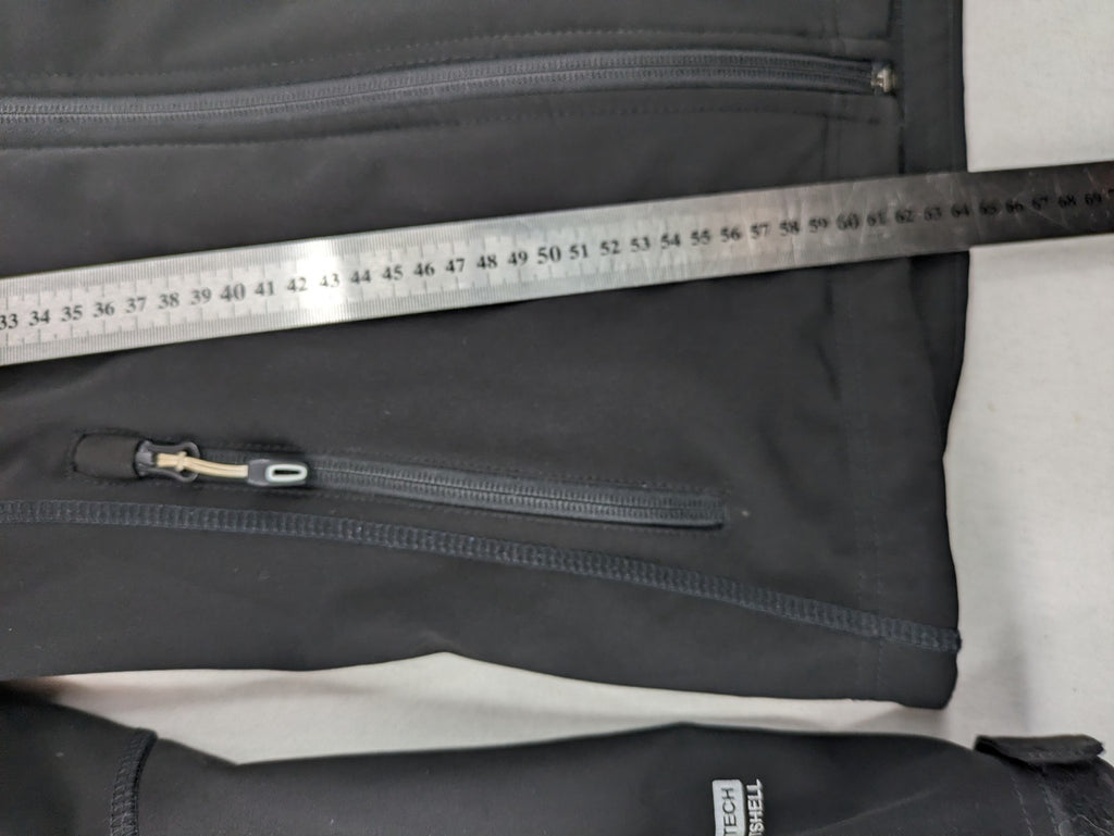Icepeak black softshell jacket with fleece lining, adjustable hood, and zippered pockets.