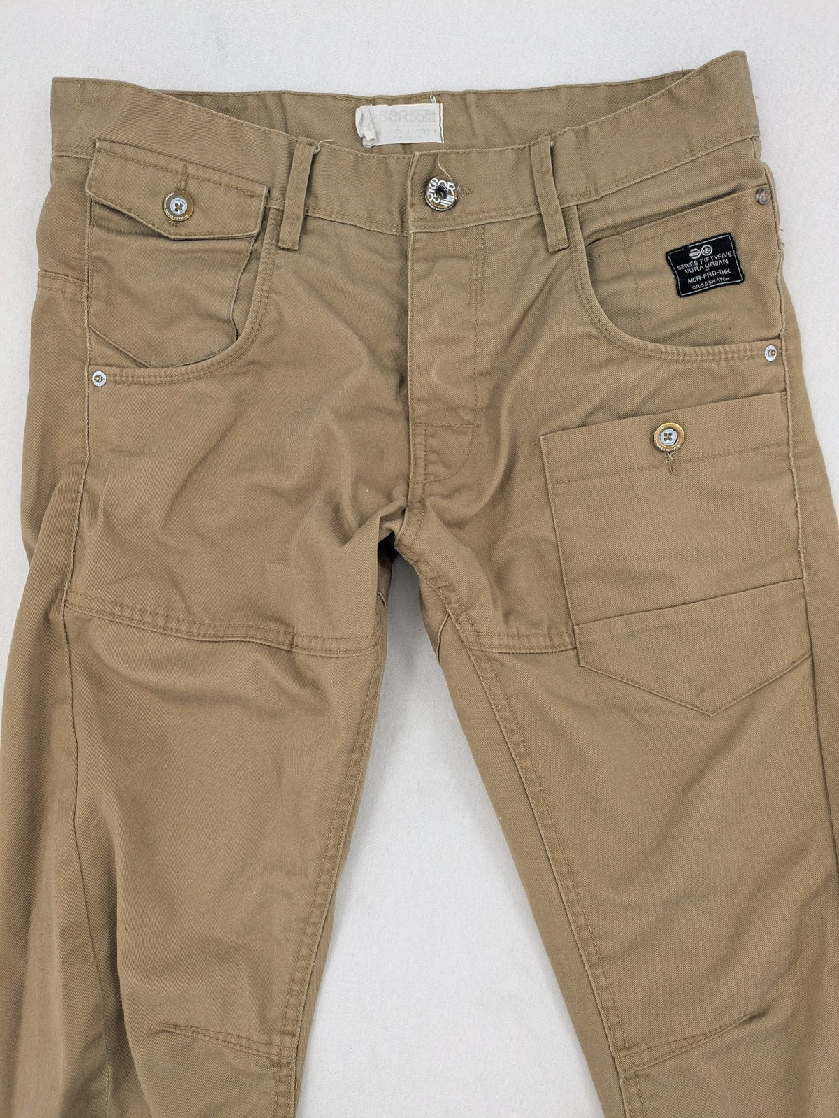 Crosshatch grey cargo pants with multiple pockets and durable cotton-polyester blend.