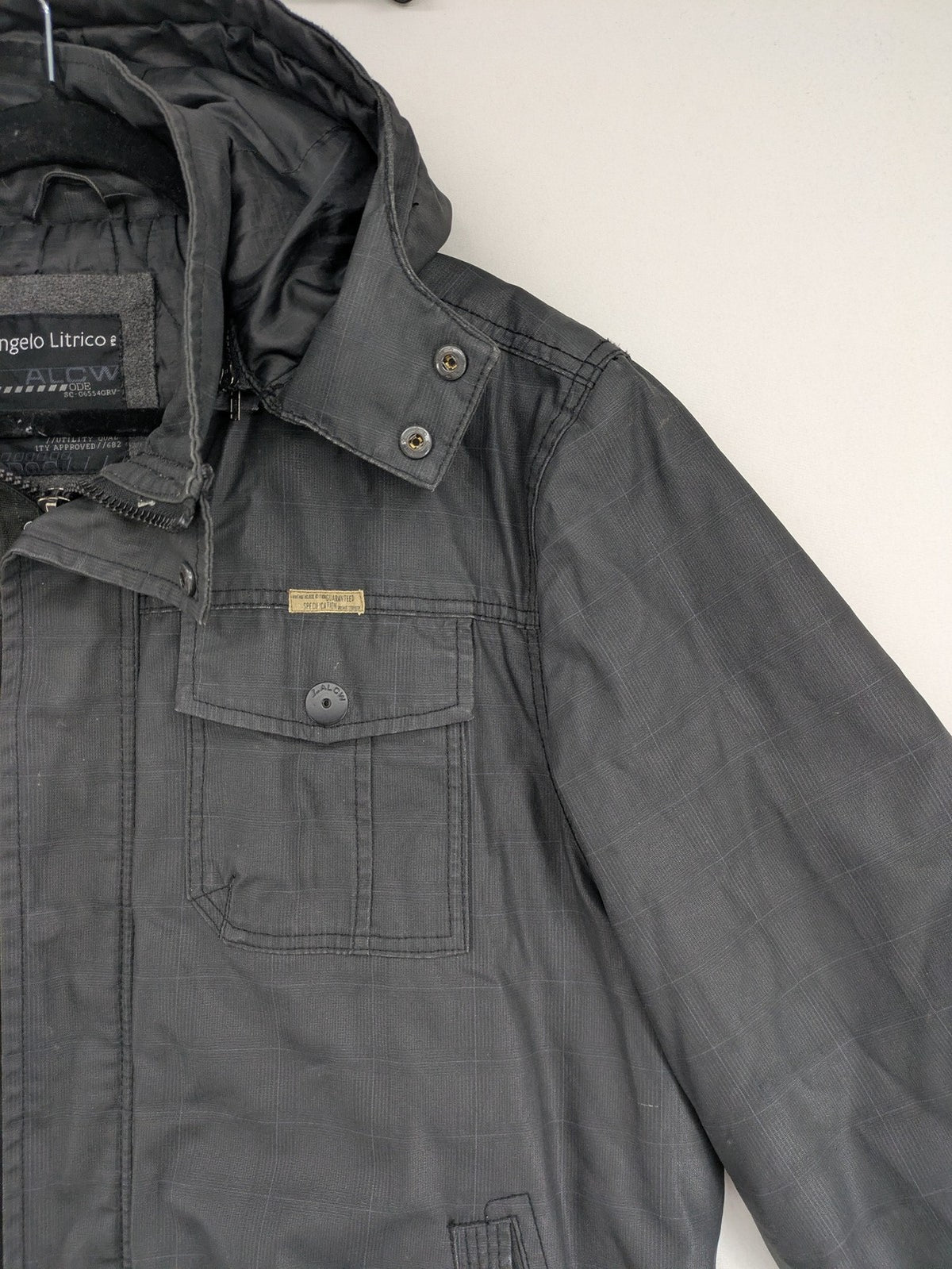 Angelo Litrico grey pilot jacket with removable hood, zip closure, and multiple pockets.
