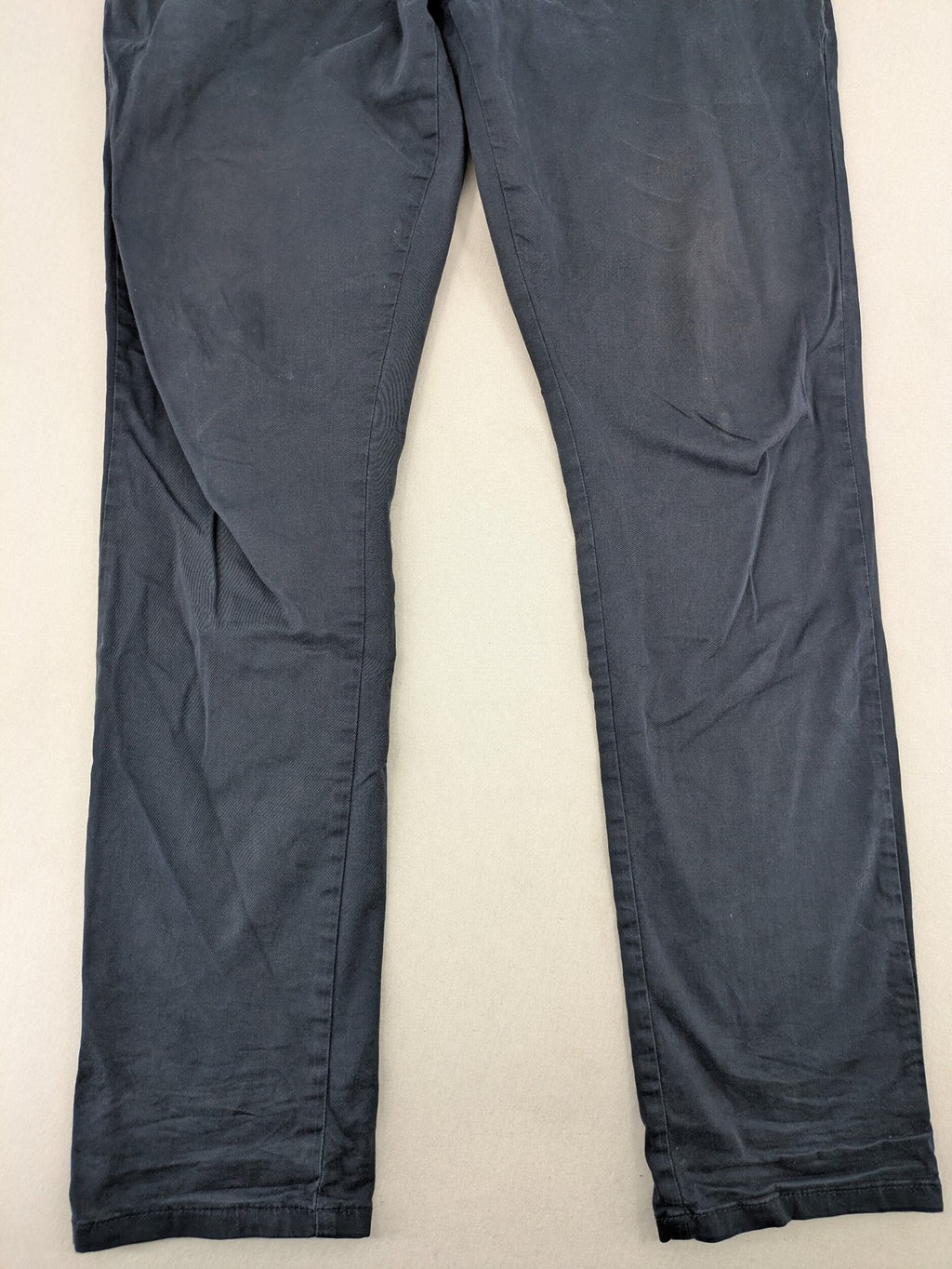 smog blue chino pants with belt loops, button fly, and side pockets