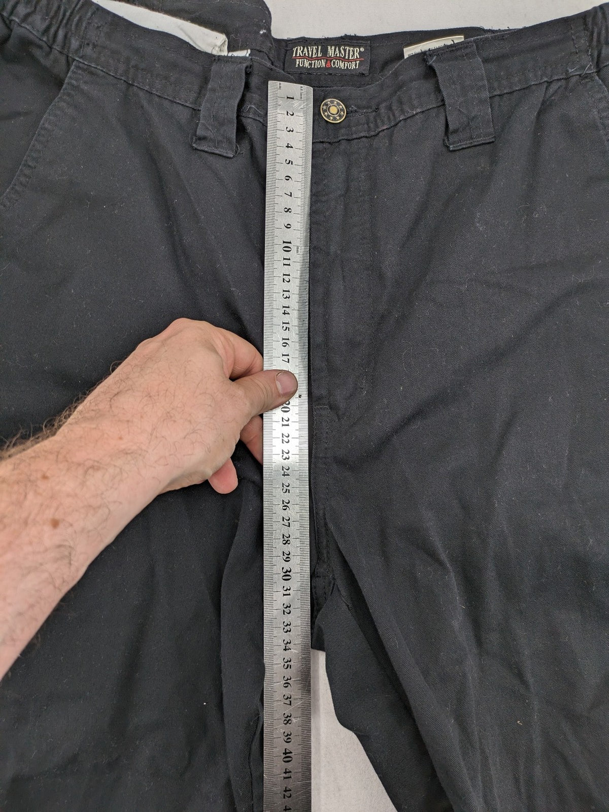 Travel Master black hunting and tactical pants, zip-off design, 100% cotton, multiple pockets.