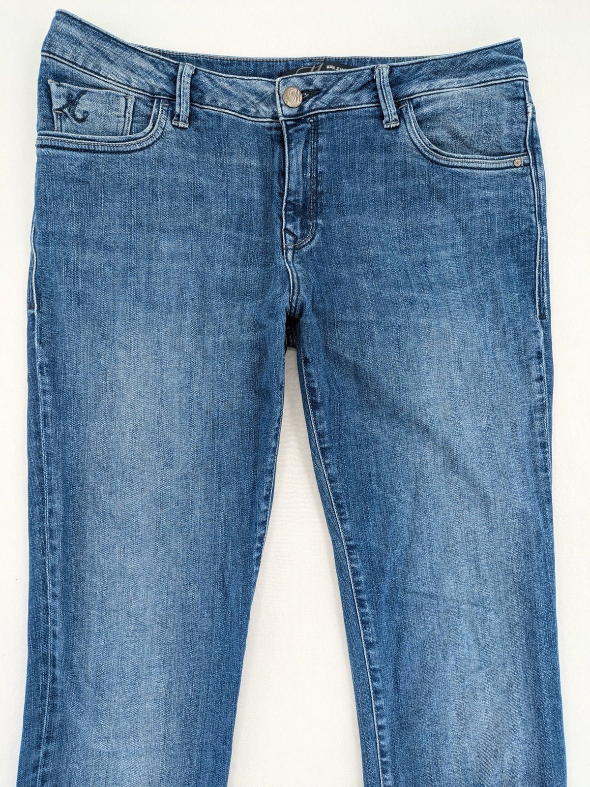 Mavi blue straight leg jeans with classic 5-pocket styling and medium wash.