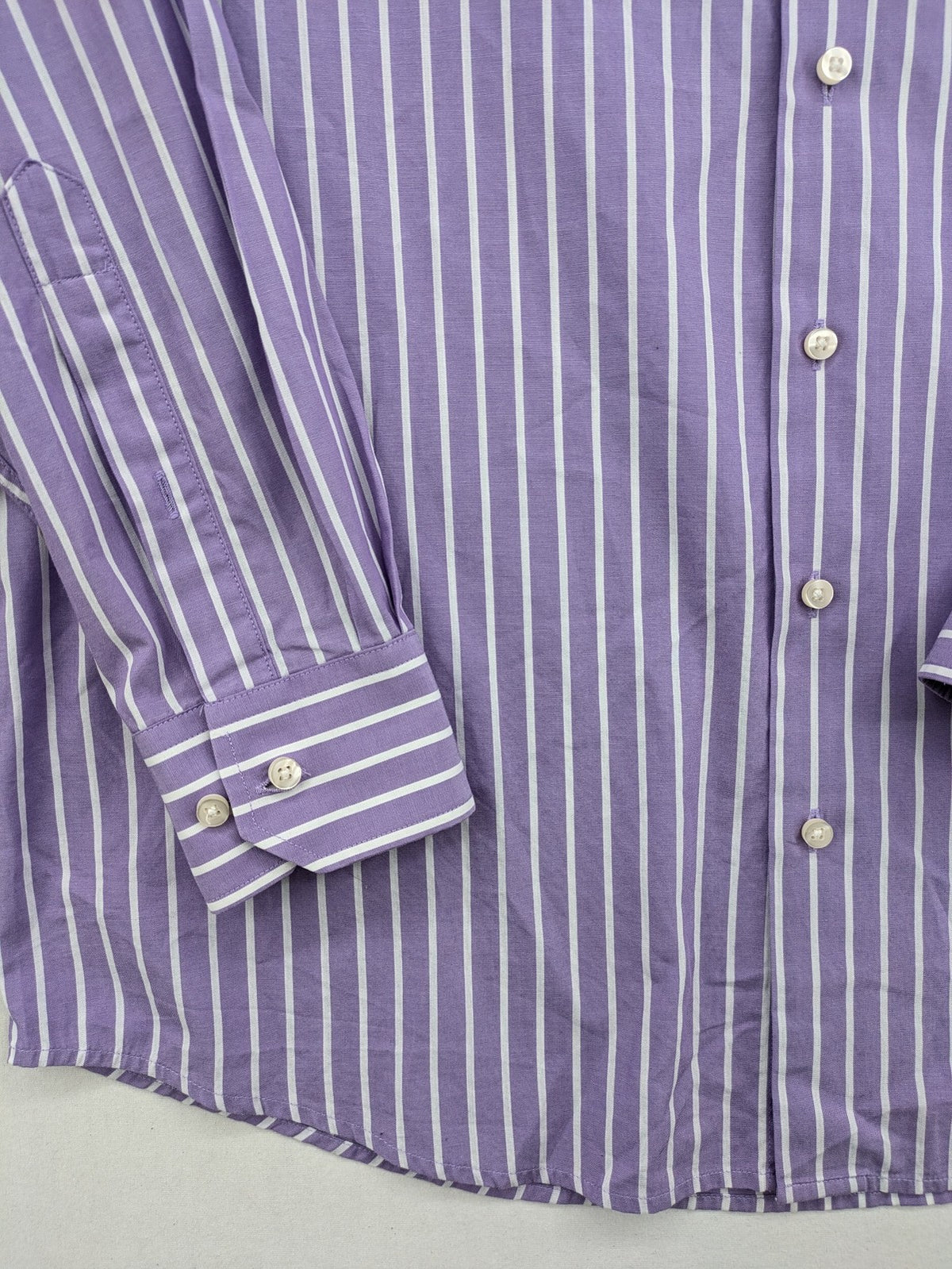 C.Comberti pink button-up shirt with vertical purple and white stripes, easy-care fabric.