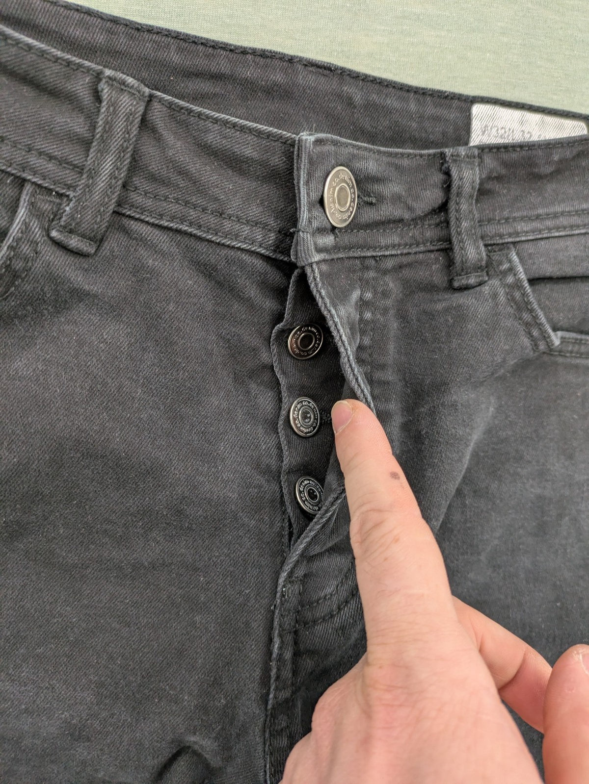 Denim & Co. grey slim fit jeans with button fly and classic 5-pocket design.