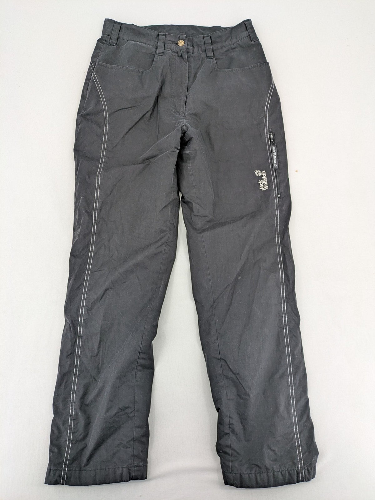 Jack Wolfskin grey outdoor pants with embroidered logo and side zip pocket.
