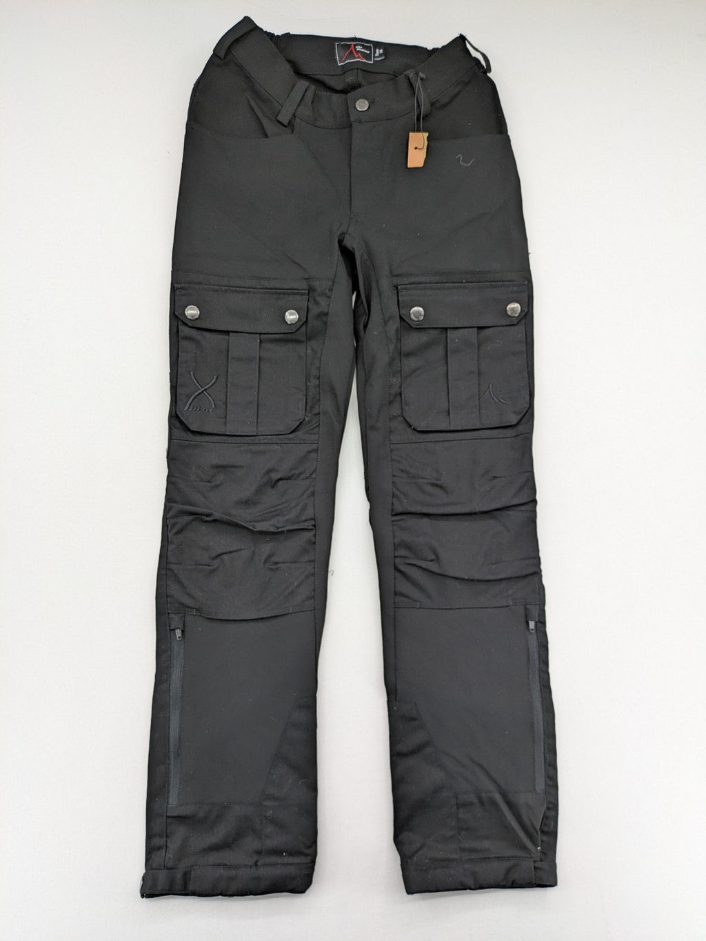 High Mountain black cargo pants with multiple pockets and durable stretch material.