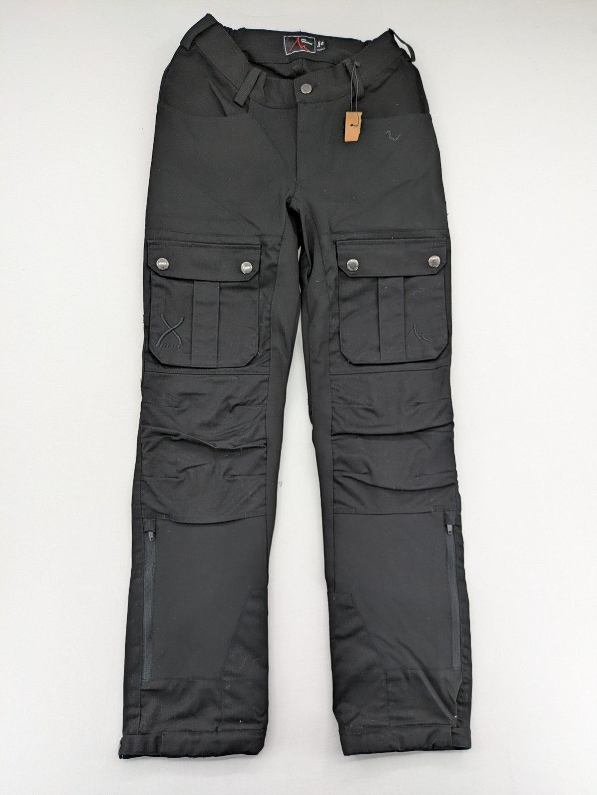 High Mountain black cargo pants with multiple pockets and durable stretch material.