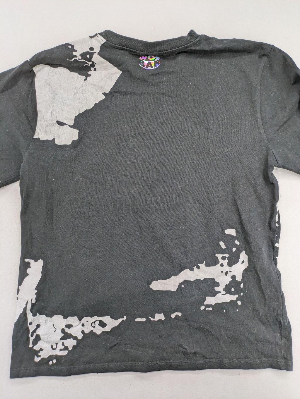 Barrow grey t-shirt with large black and white smiley graphic print and logo patch.