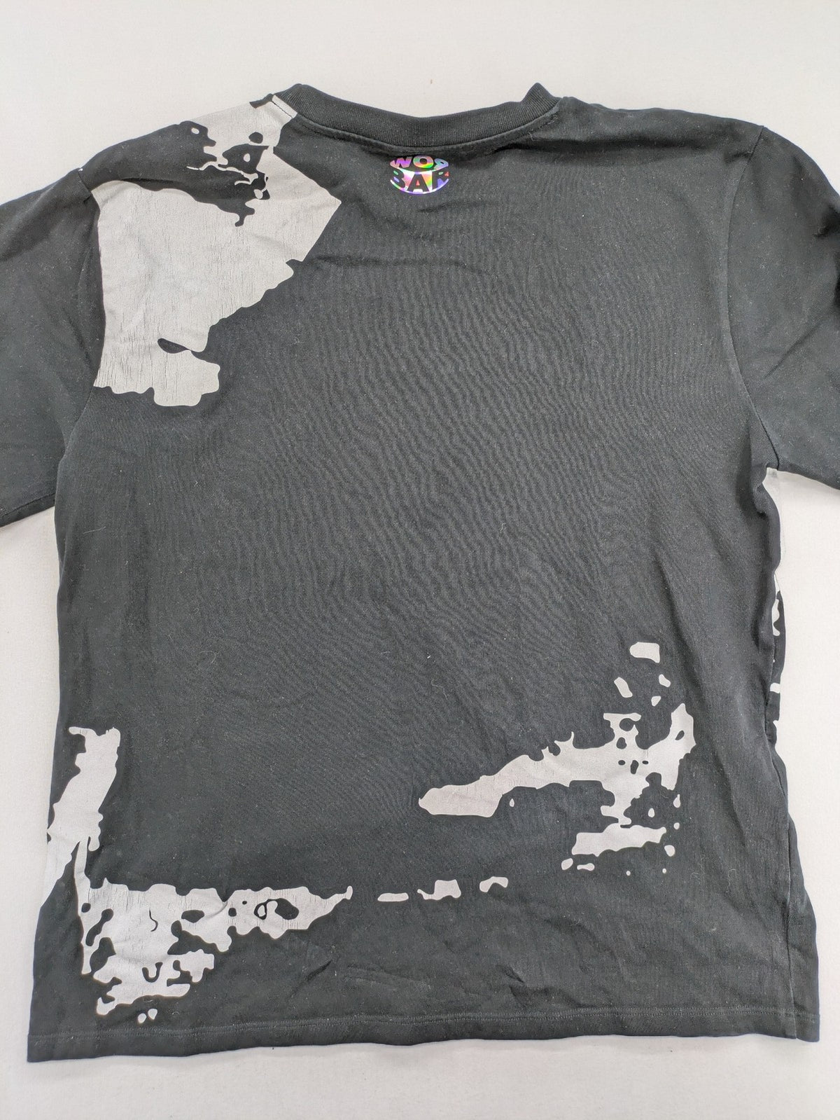Barrow grey t-shirt with large black and white smiley graphic print and logo patch.