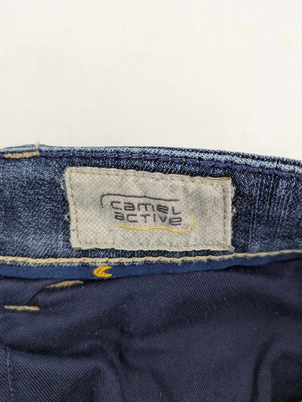 Camel Active blue straight jeans with classic 5-pocket design and logo patch.