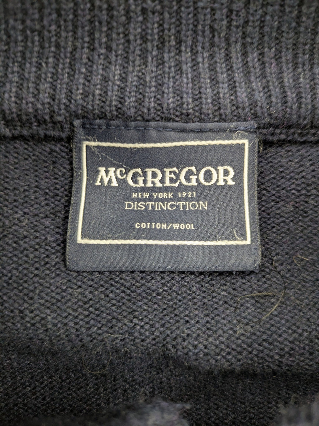 McGregor blue cardigan with elbow patches, button front, subtle logo, cotton-wool blend.