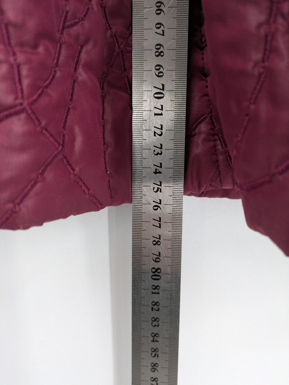 Laura Kent burgundy puffer coat with leopard print collar and cuffs, 100% polyester.