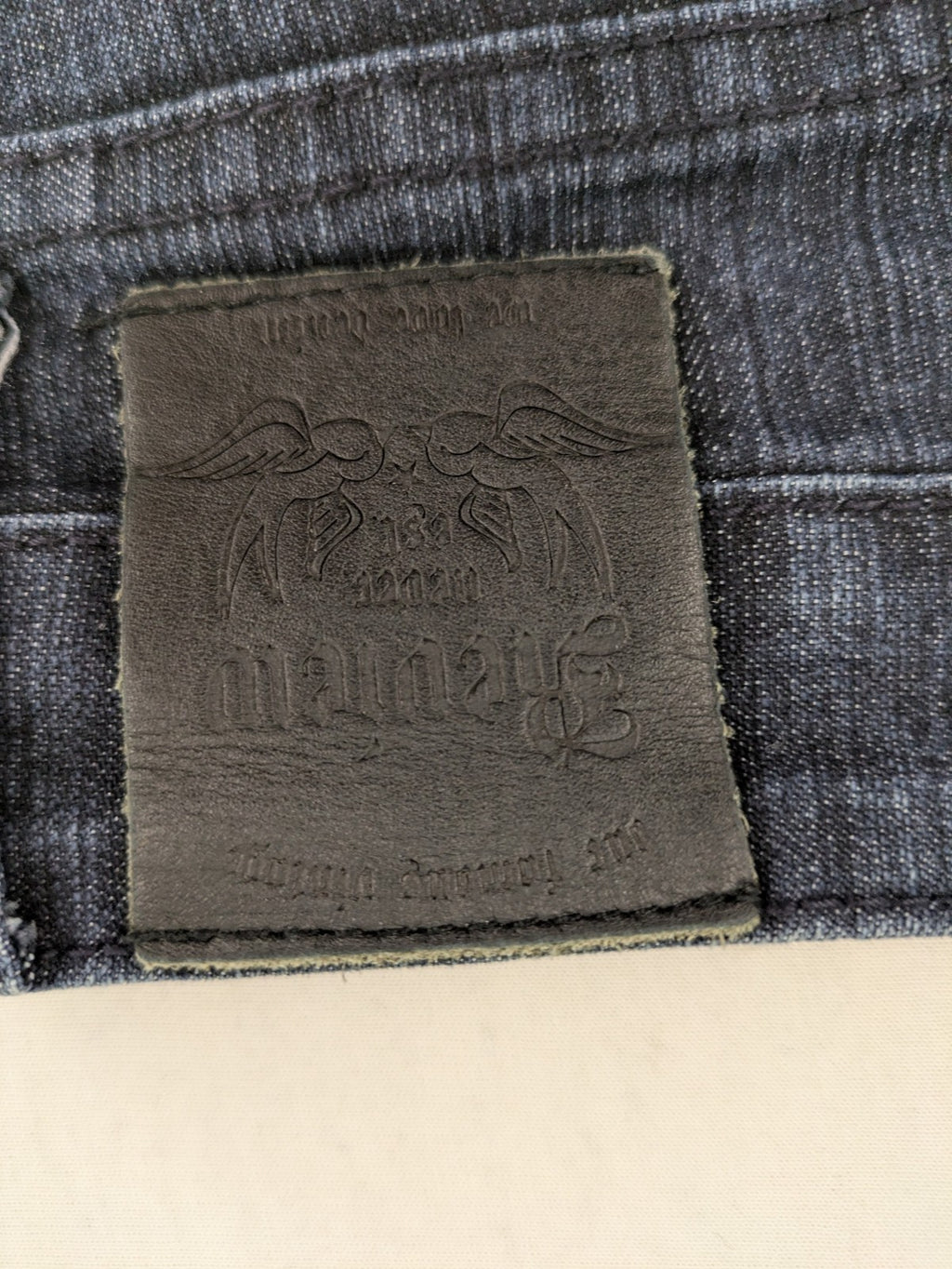 Review straight leg jeans dark blue low rise stretch denim with classic design.