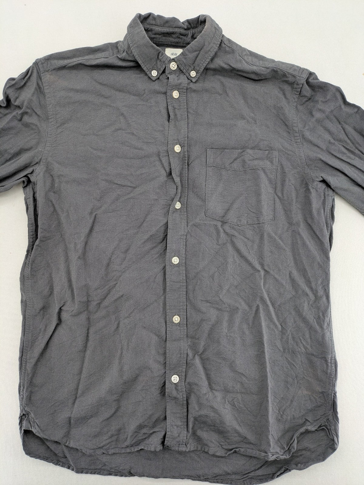 H&M L.O.G.G. grey button-down shirt, regular fit, single chest pocket, cotton material.