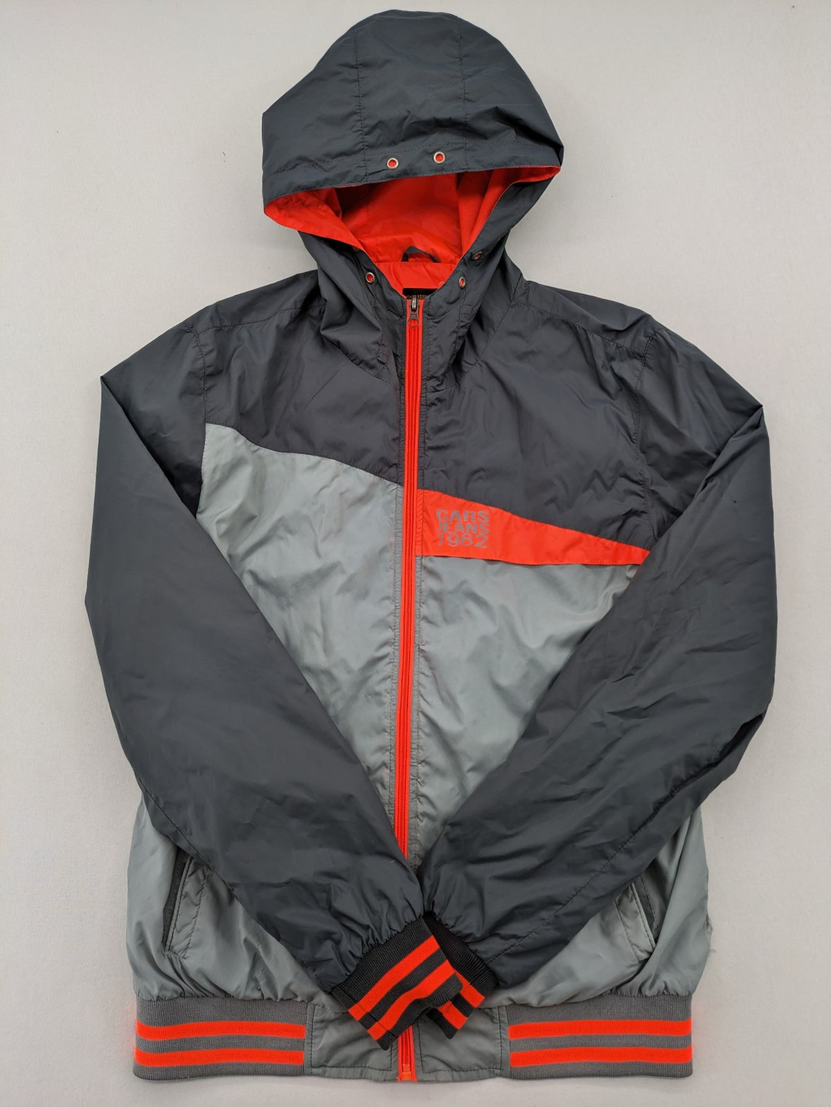Cars Jeans windbreaker jacket grey orange color block design with logo on chest.