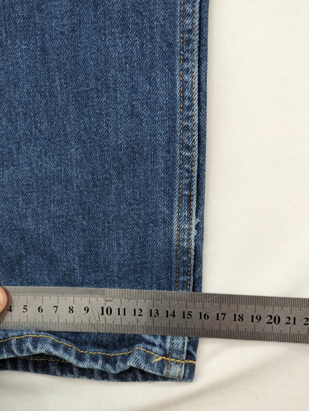 Hollister blue super skinny jeans medium wash button fly with faded details.