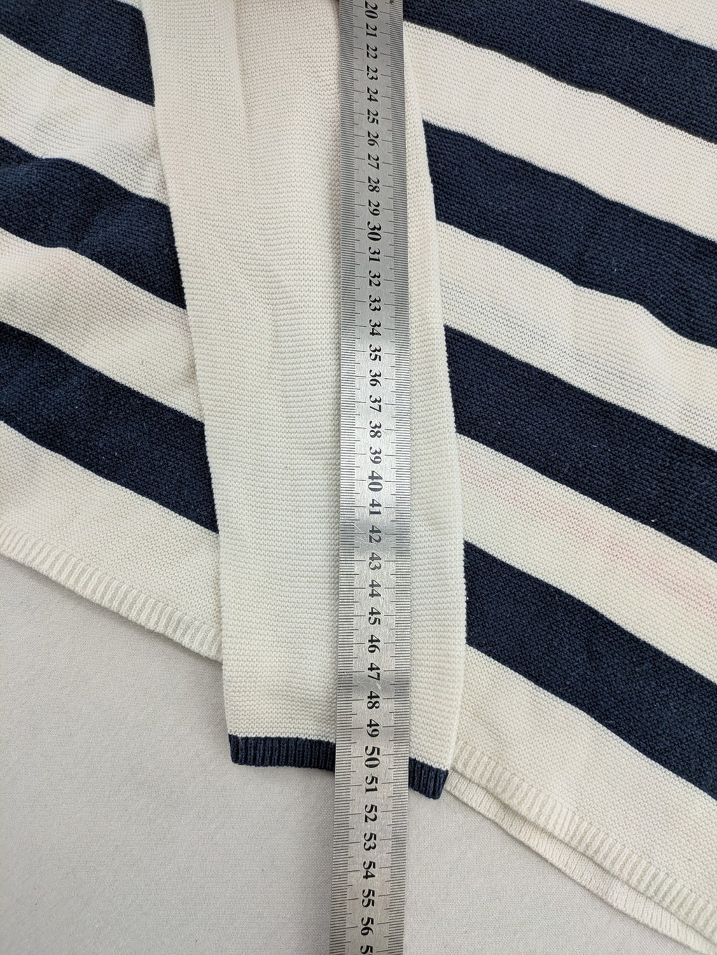 Tom Tailor cream turtle neck jumper with navy stripes and red accent, featuring anchor embroidery.