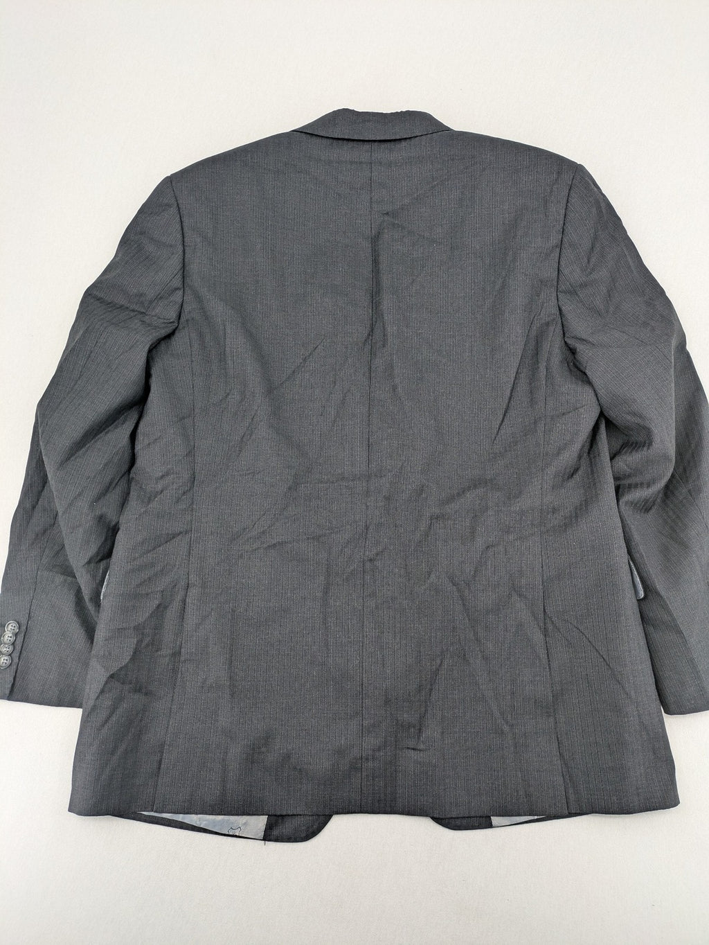 Desch grey blazer with dark grey pinstripe pattern, satin lining, and tailored design.