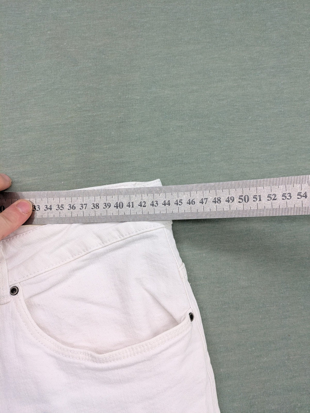 Blue Motion white tapered fit jeans with classic 5-pocket design and stretch cotton material.
