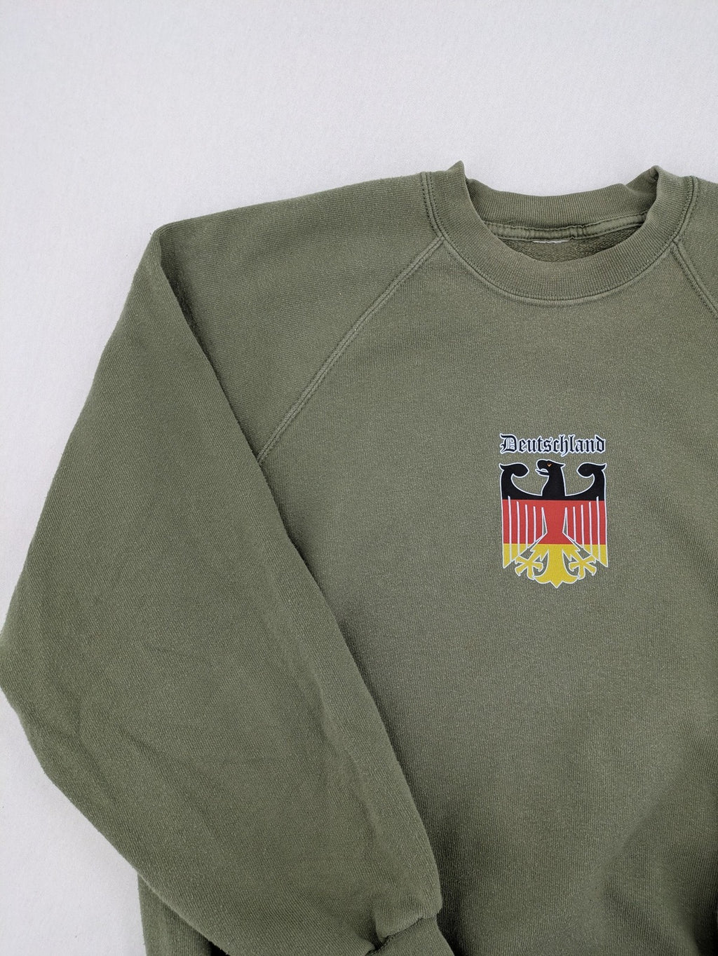 Vintage Deutschland turtle neck jumper khaki with eagle crest and raglan sleeves.
