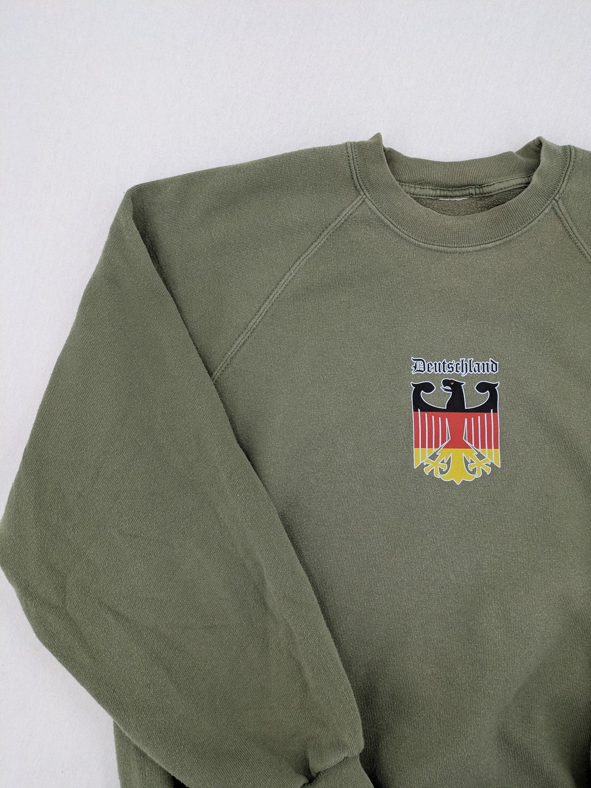 Vintage Deutschland turtle neck jumper khaki with eagle crest and raglan sleeves.