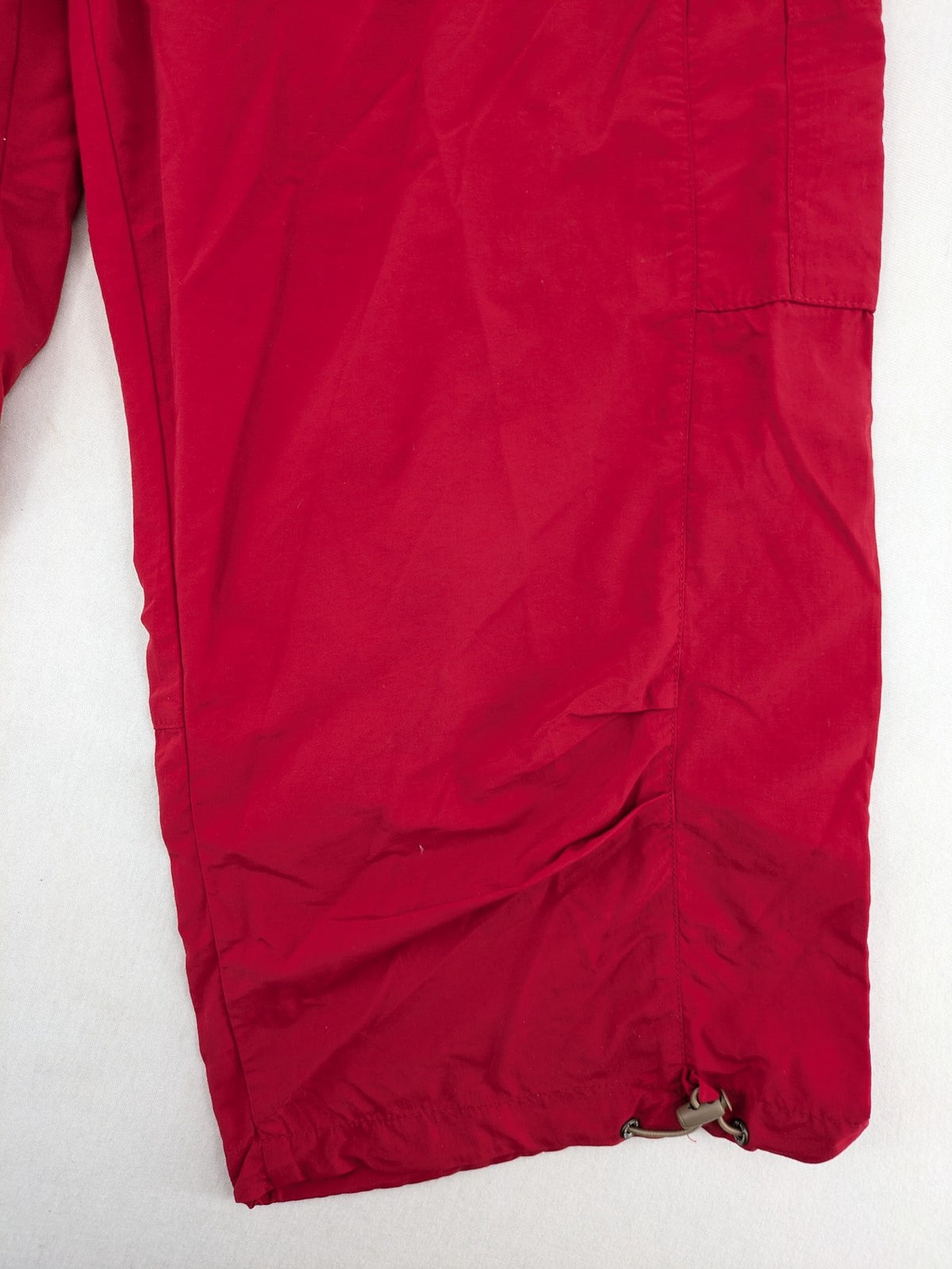 Skila red outdoor capri pants lightweight polyamide with adjustable drawstrings and pockets.