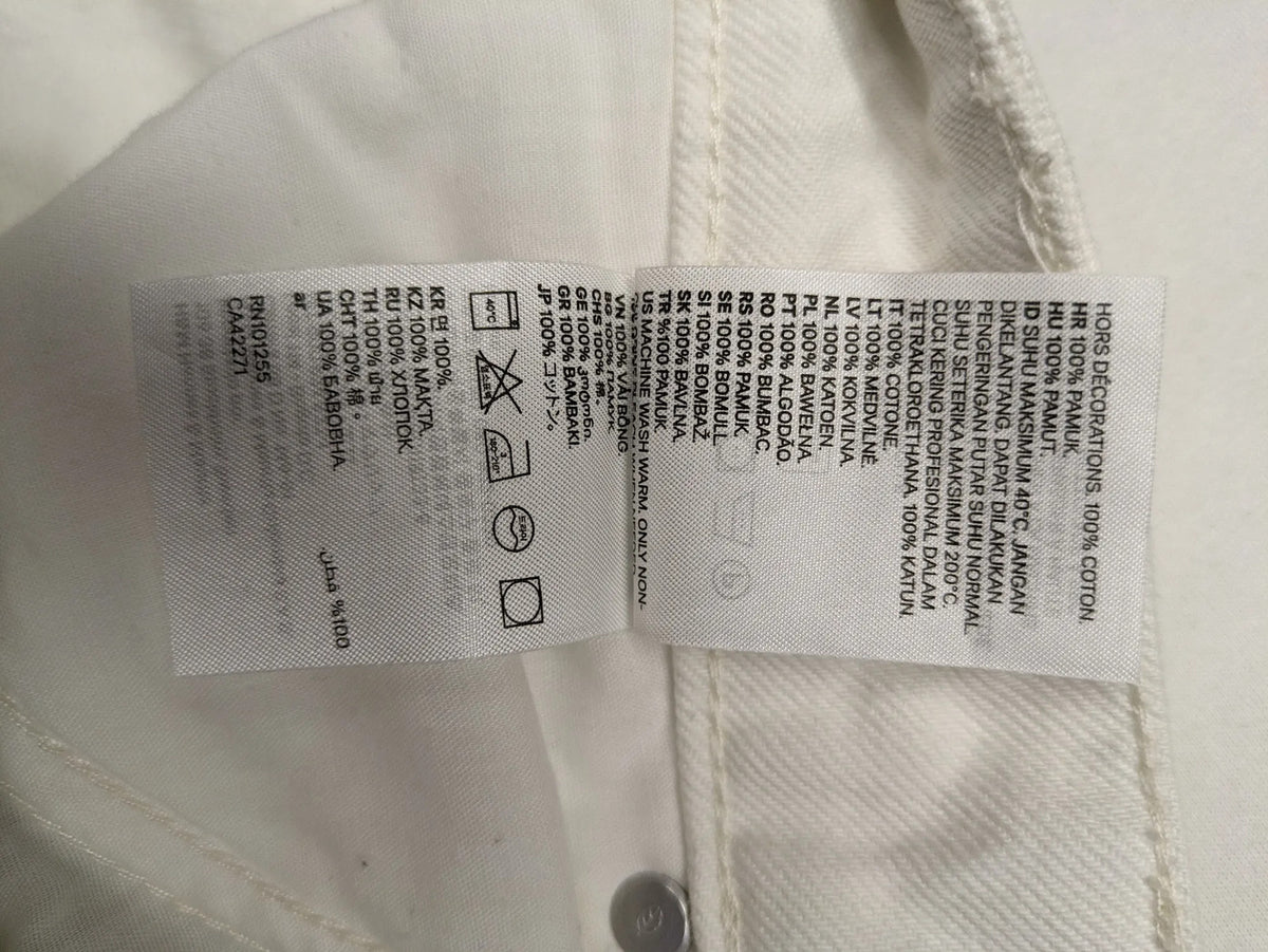 H&M white straight jeans high rise 5-pocket style made from 100% cotton.