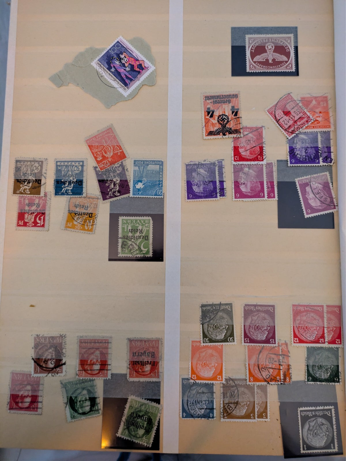Beige postage stamp album featuring over 1000 stamps from Germany and Europe.