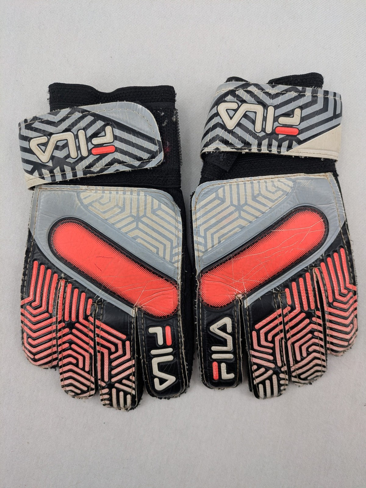 Fila soccer gloves black grey red geometric pattern padded backhand