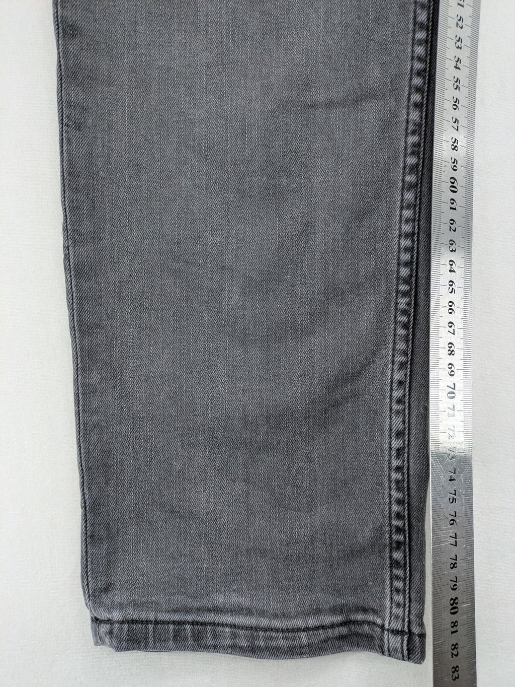 Lee straight jeans grey 5-pocket design with subtle branding on back pocket.