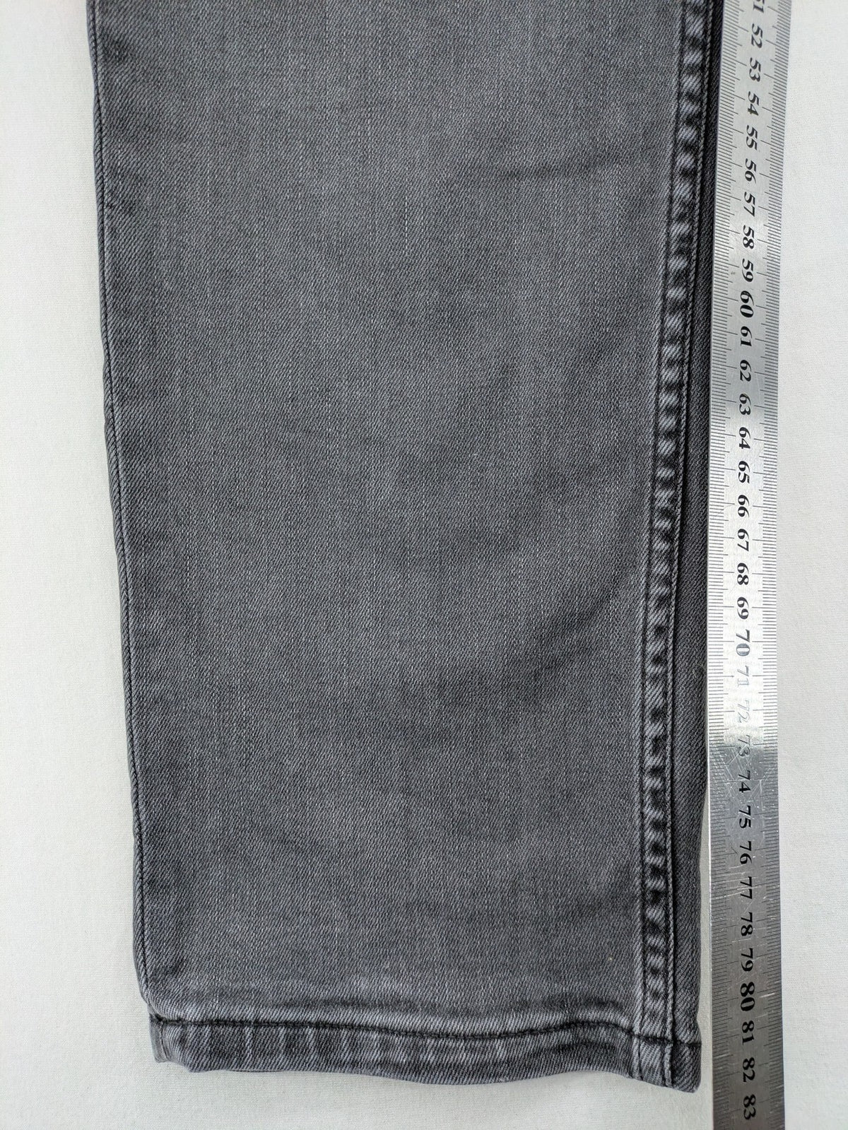 Lee straight jeans grey 5-pocket design with subtle branding on back pocket.