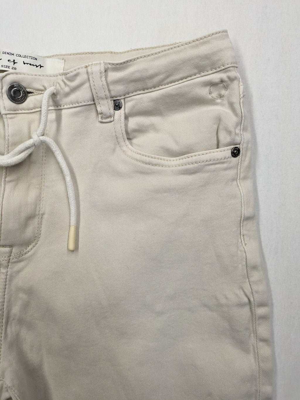 Circle Of Trust beige straight jeans with elastic waistband, drawstring, and classic 5-pocket design.