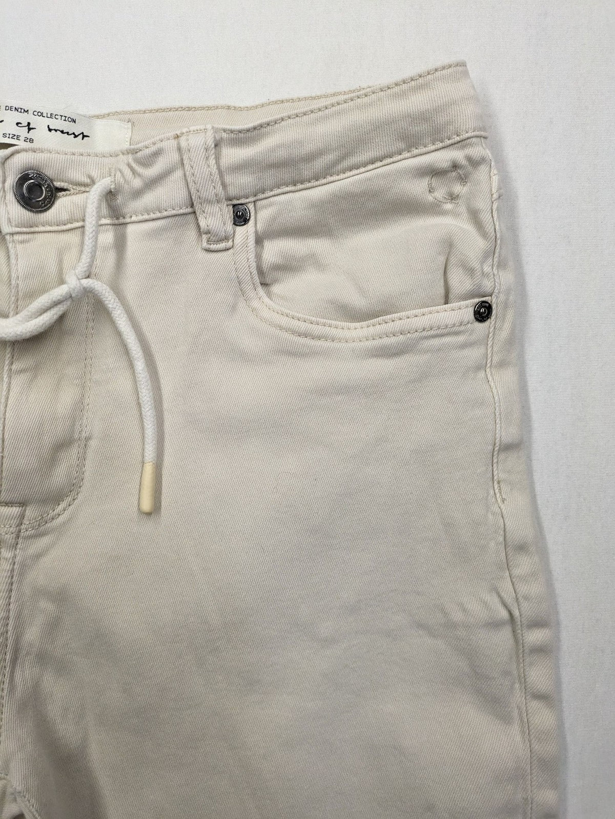 Circle Of Trust beige straight jeans with elastic waistband, drawstring, and classic 5-pocket design.