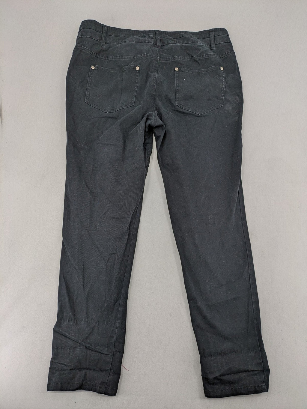 REI grey pants asymmetrical design with diagonal zipper and button placket, cotton blend.