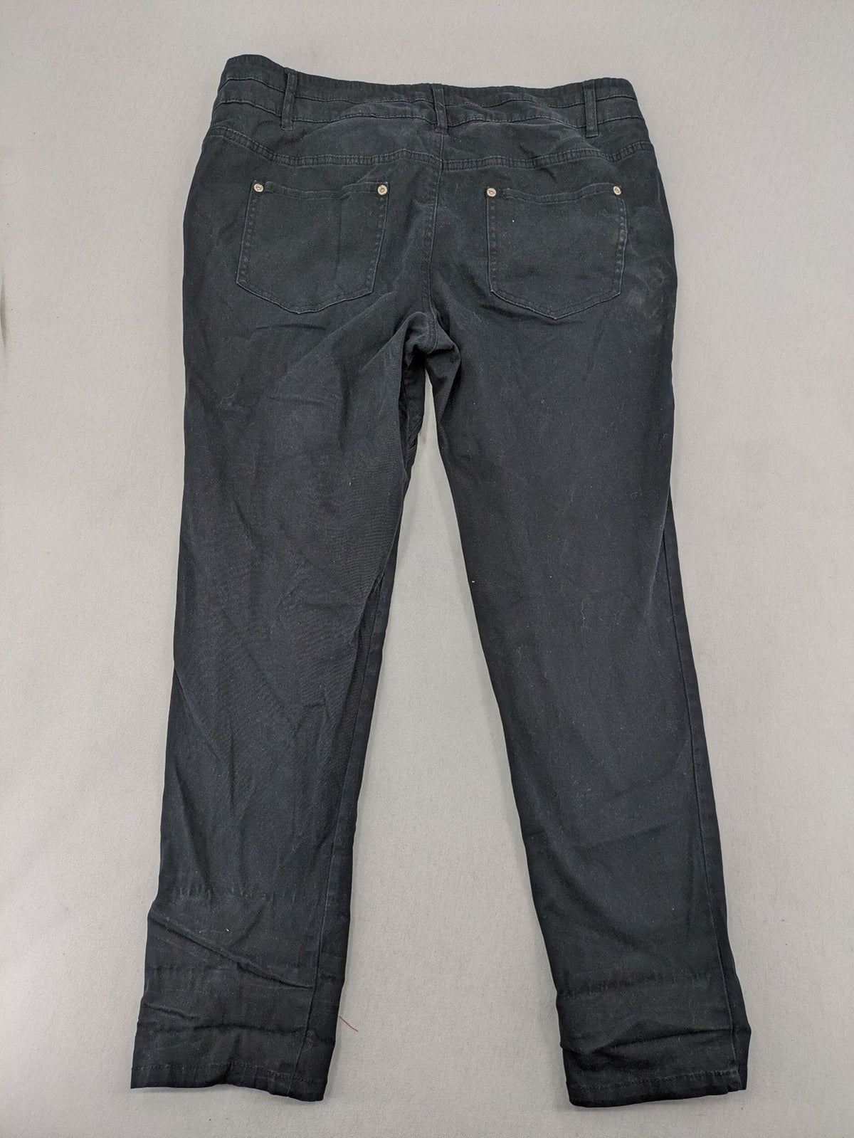 REI grey pants asymmetrical design with diagonal zipper and button placket, cotton blend.