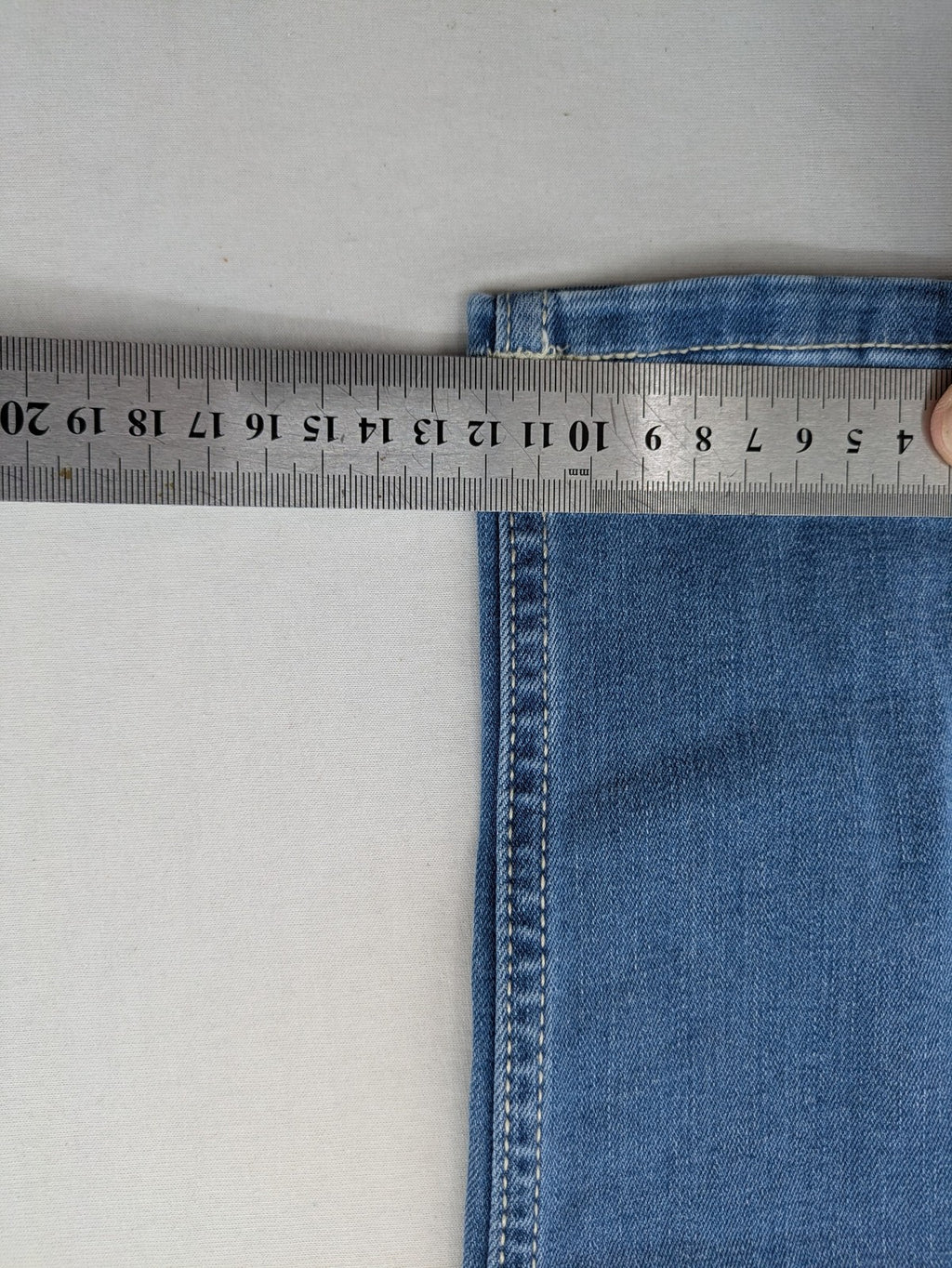 ESMARA blue super skinny jeans with medium waist and stretchy cotton blend material.