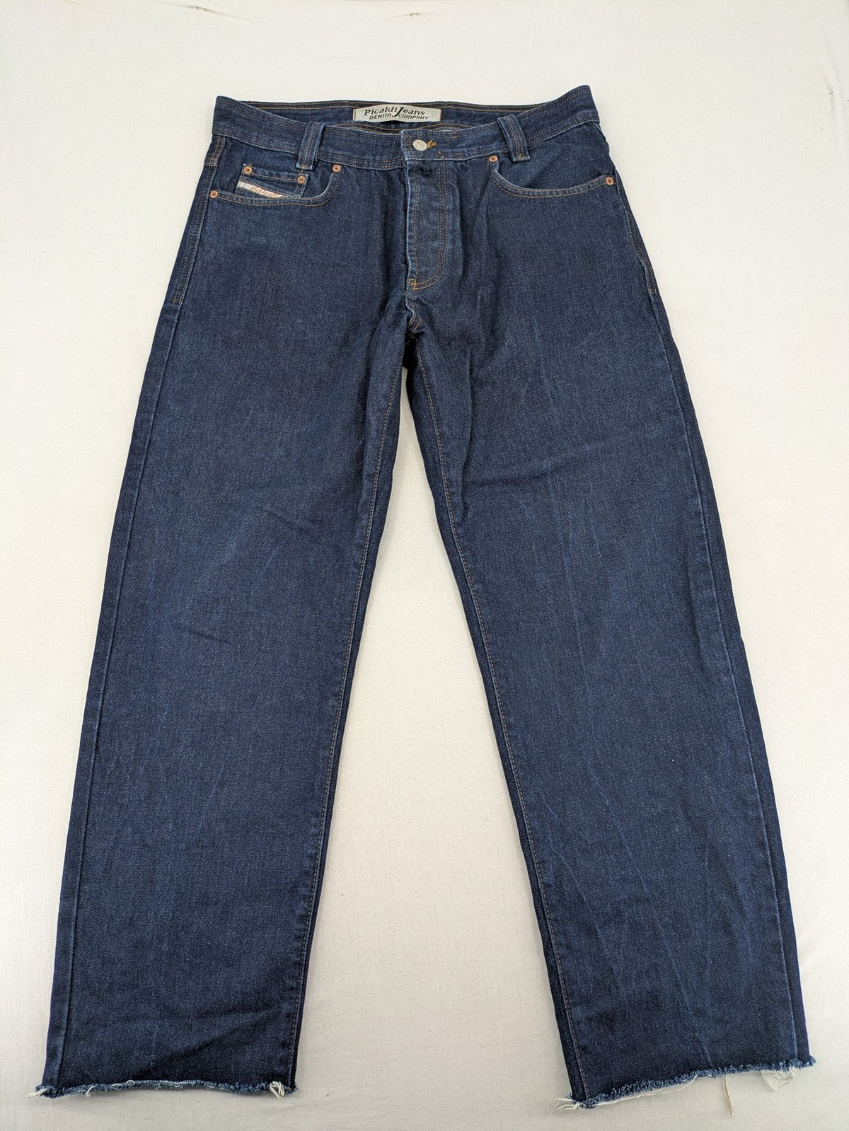 Picaldi blue straight jeans with button fly and frayed hem, 5-pocket design.