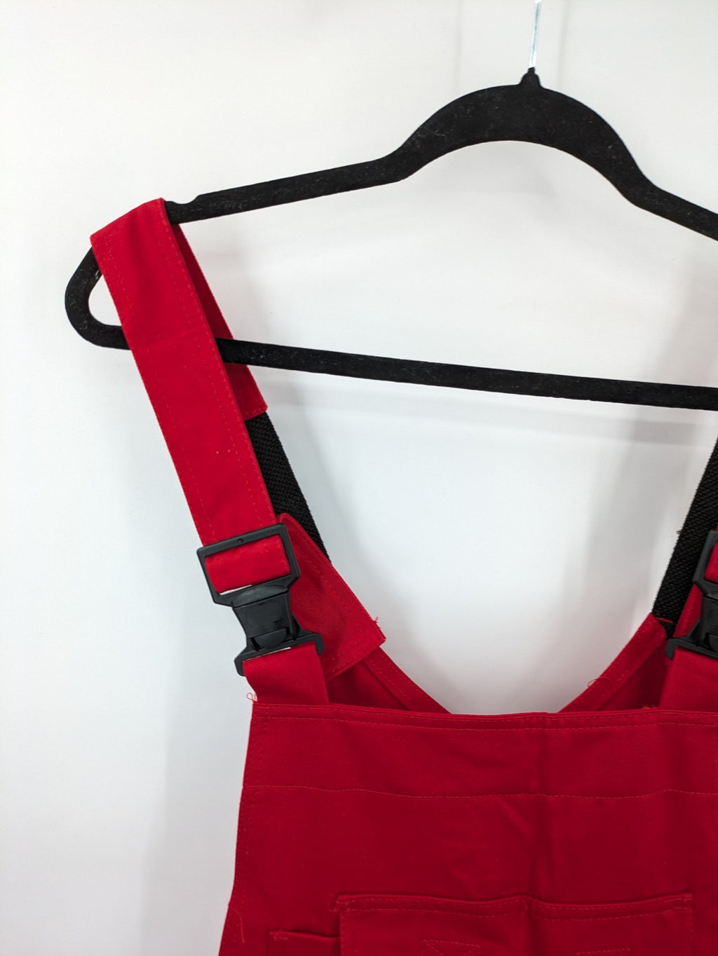 Stonekit red work overalls cotton with adjustable straps and multiple cargo pockets.