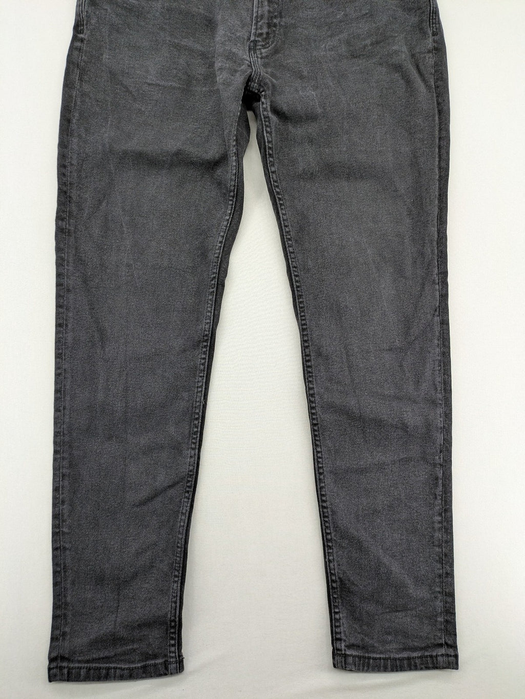 Zara black straight jeans faded wash five-pocket design with zipper closure.