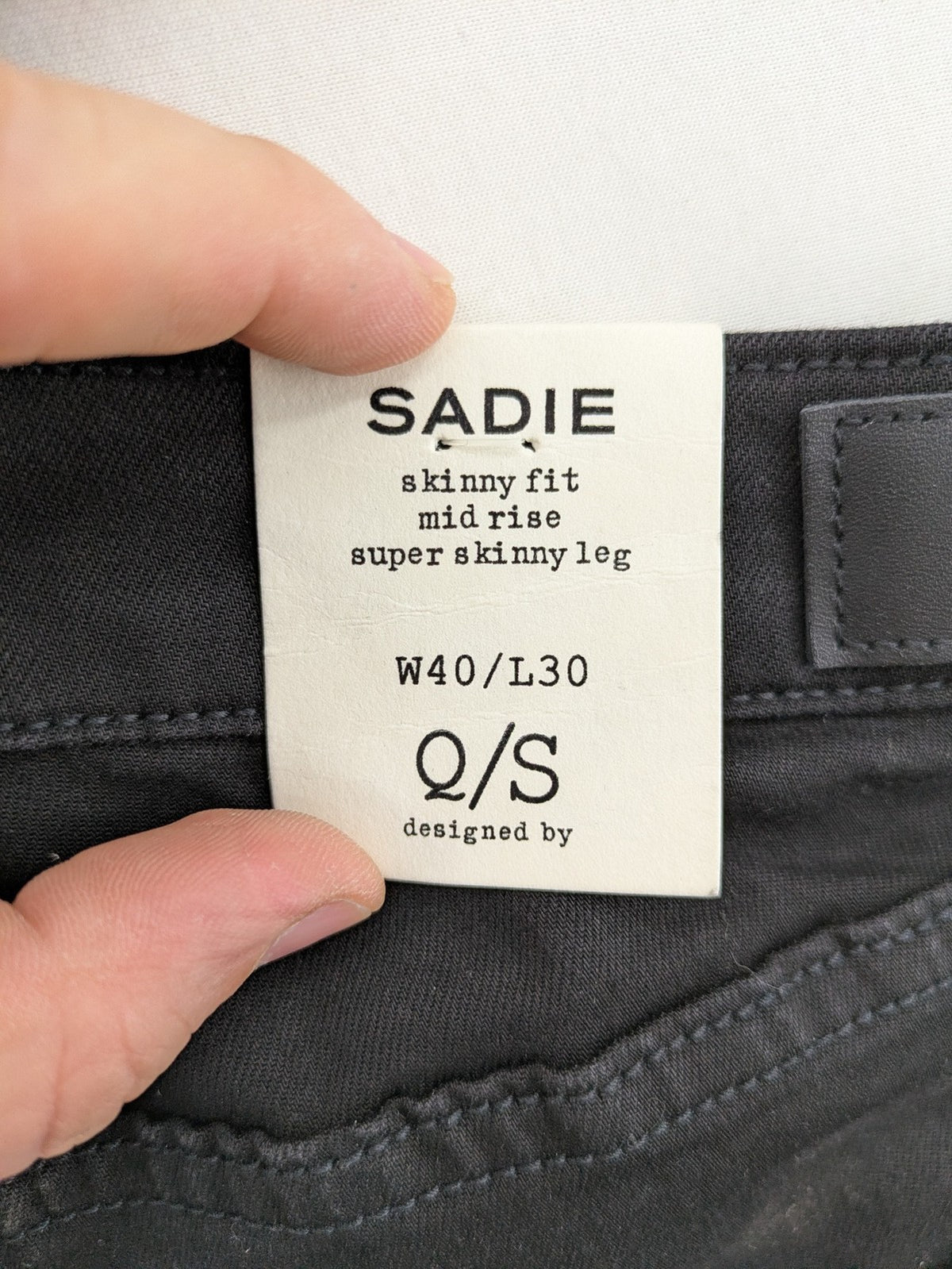 Q/S skinny fit jeans black mid-rise with stretch fabric and sleek silhouette.