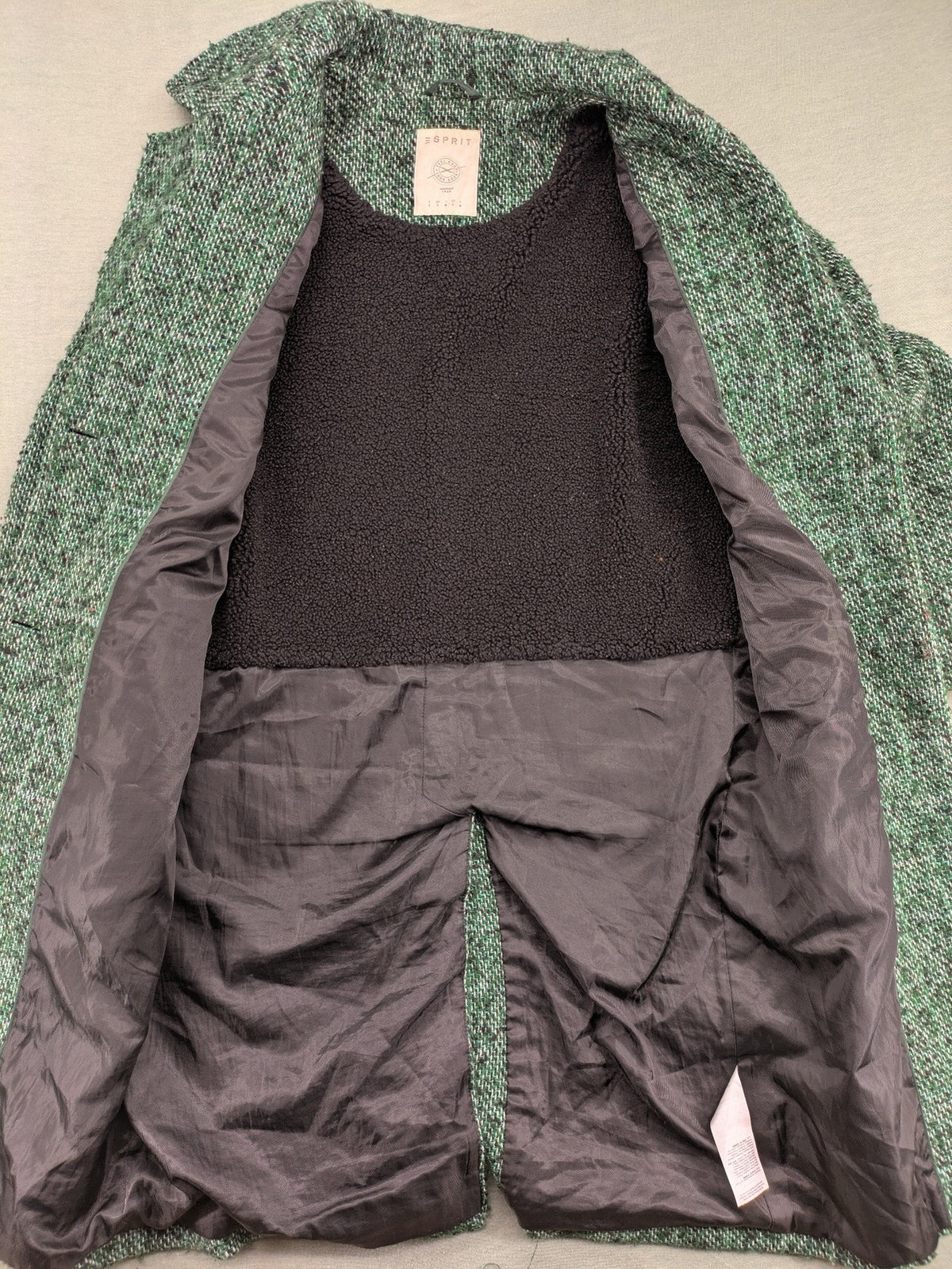 Esprit green black white tweed coat with notch collar and three-button closure.