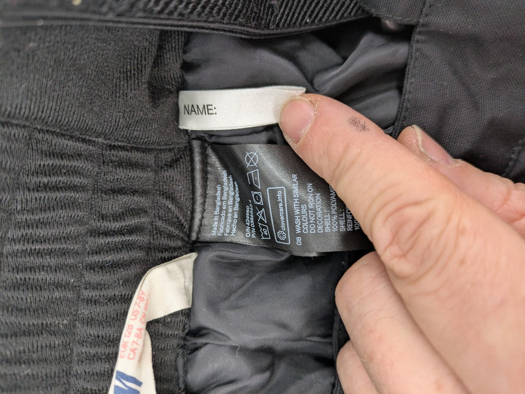 H&M grey snow overalls with adjustable straps and front zipper, durable winter wear.