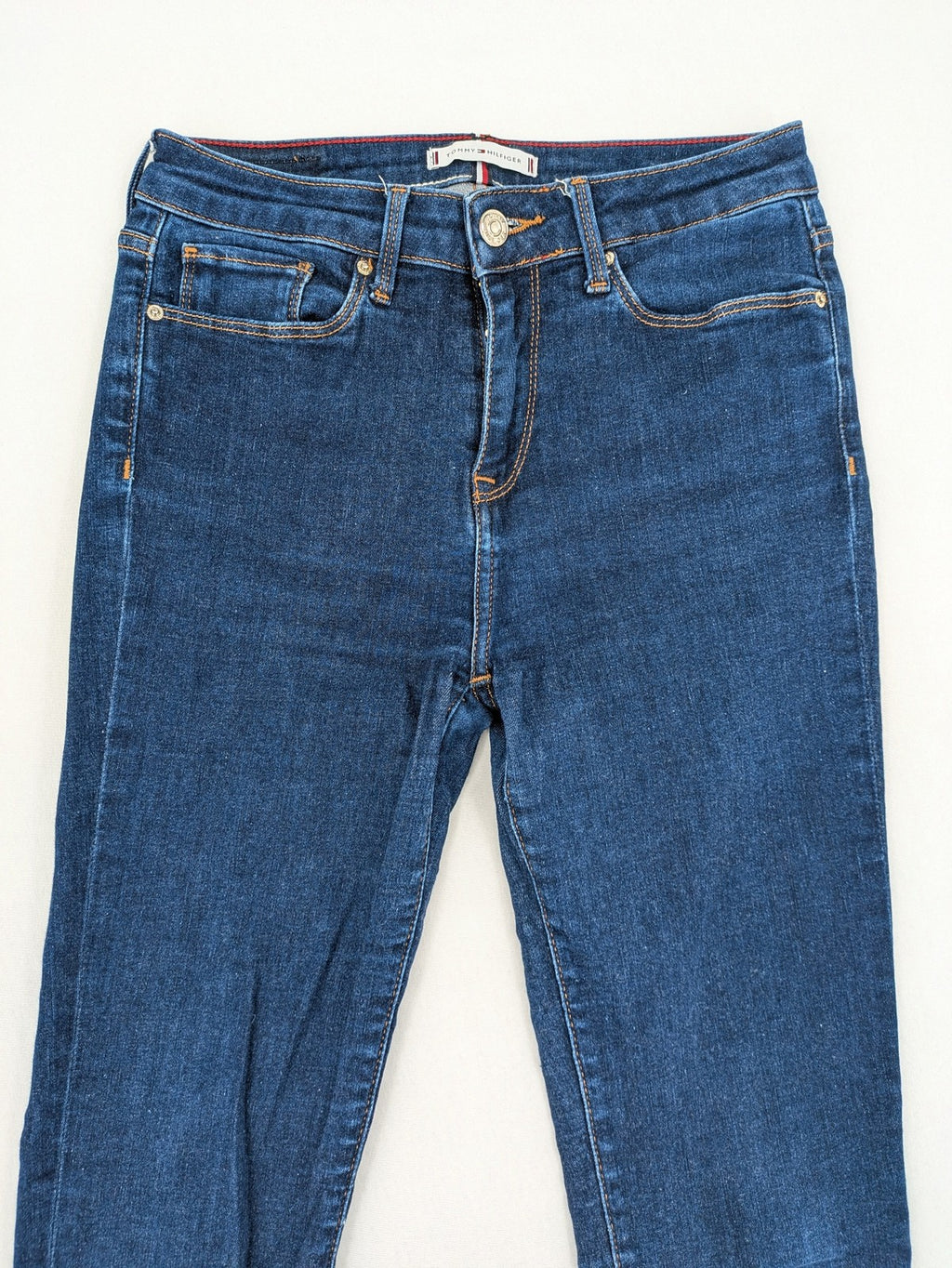 Tommy Hilfiger blue skinny jeans, five-pocket design, made from organic cotton blend.