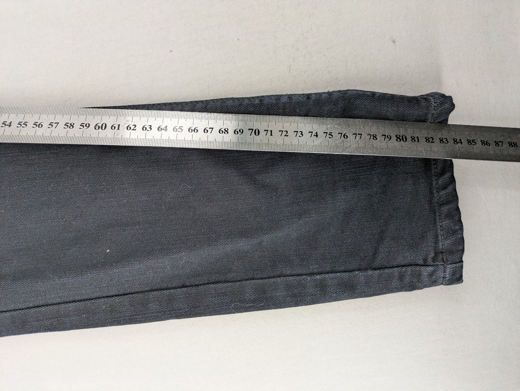 Levi's black slim fit jeans with classic 5-pocket design and zipper fly.