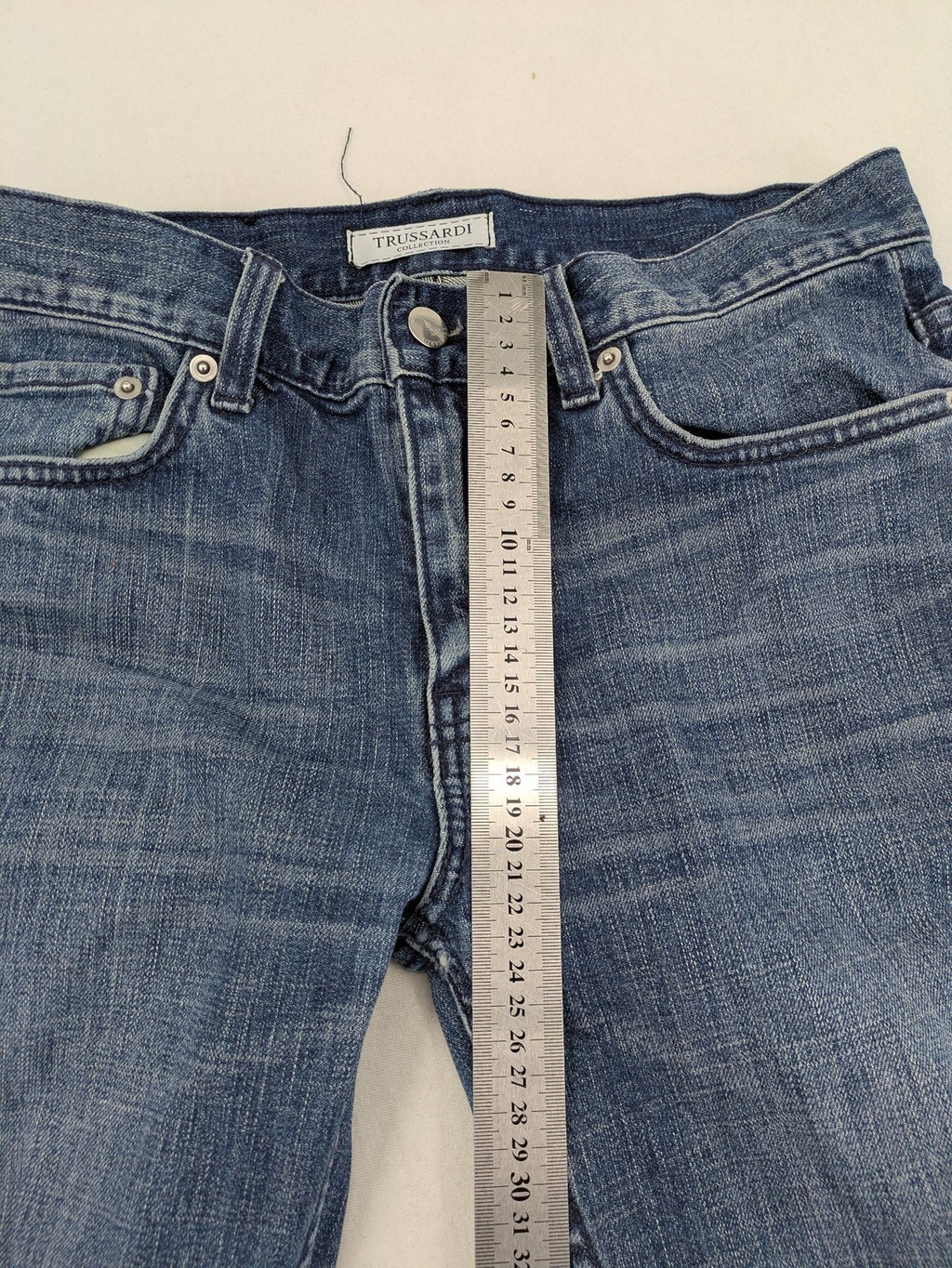 Trussardi blue straight jeans with classic 5-pocket design and durable denim material.