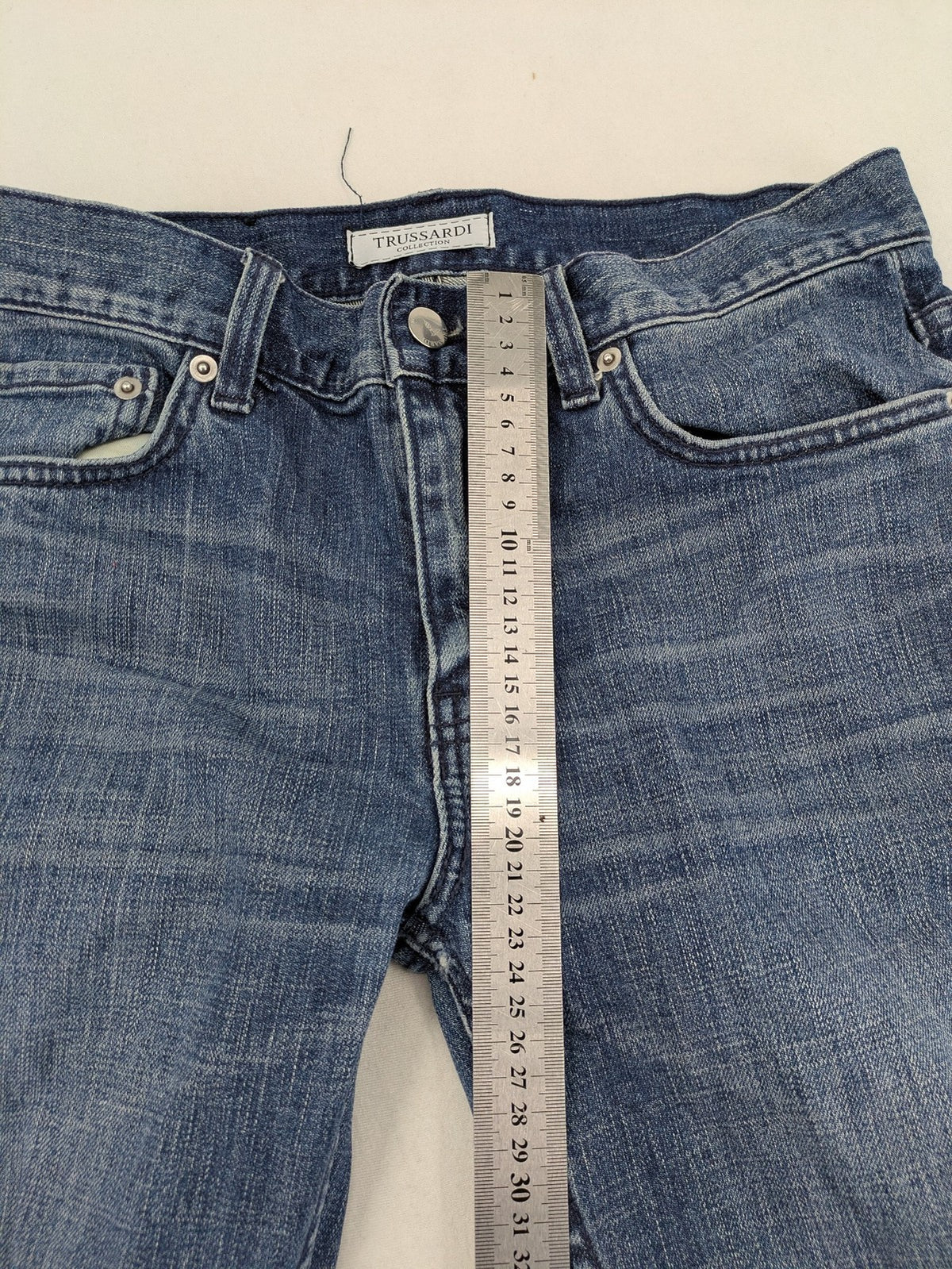 Trussardi blue straight jeans with classic 5-pocket design and durable denim material.