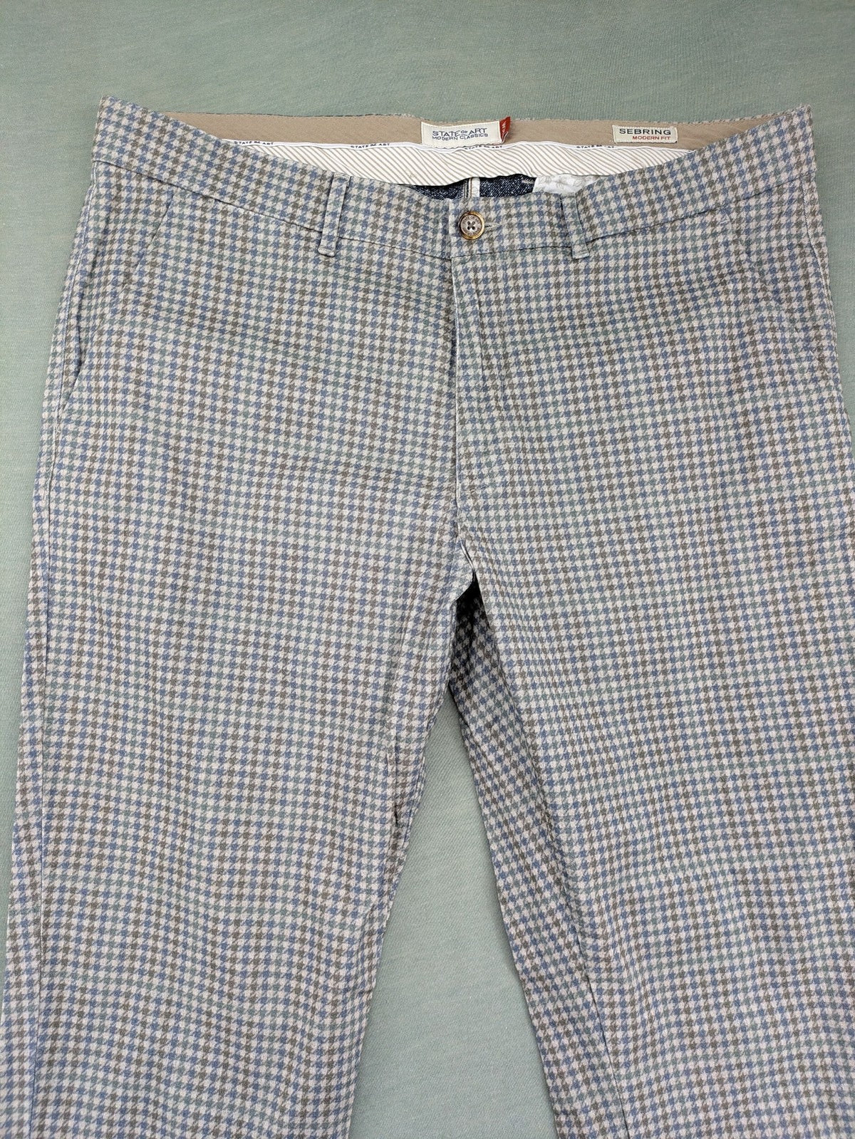 State of Art pink pants houndstooth pattern modern fit with zipper and button closure.